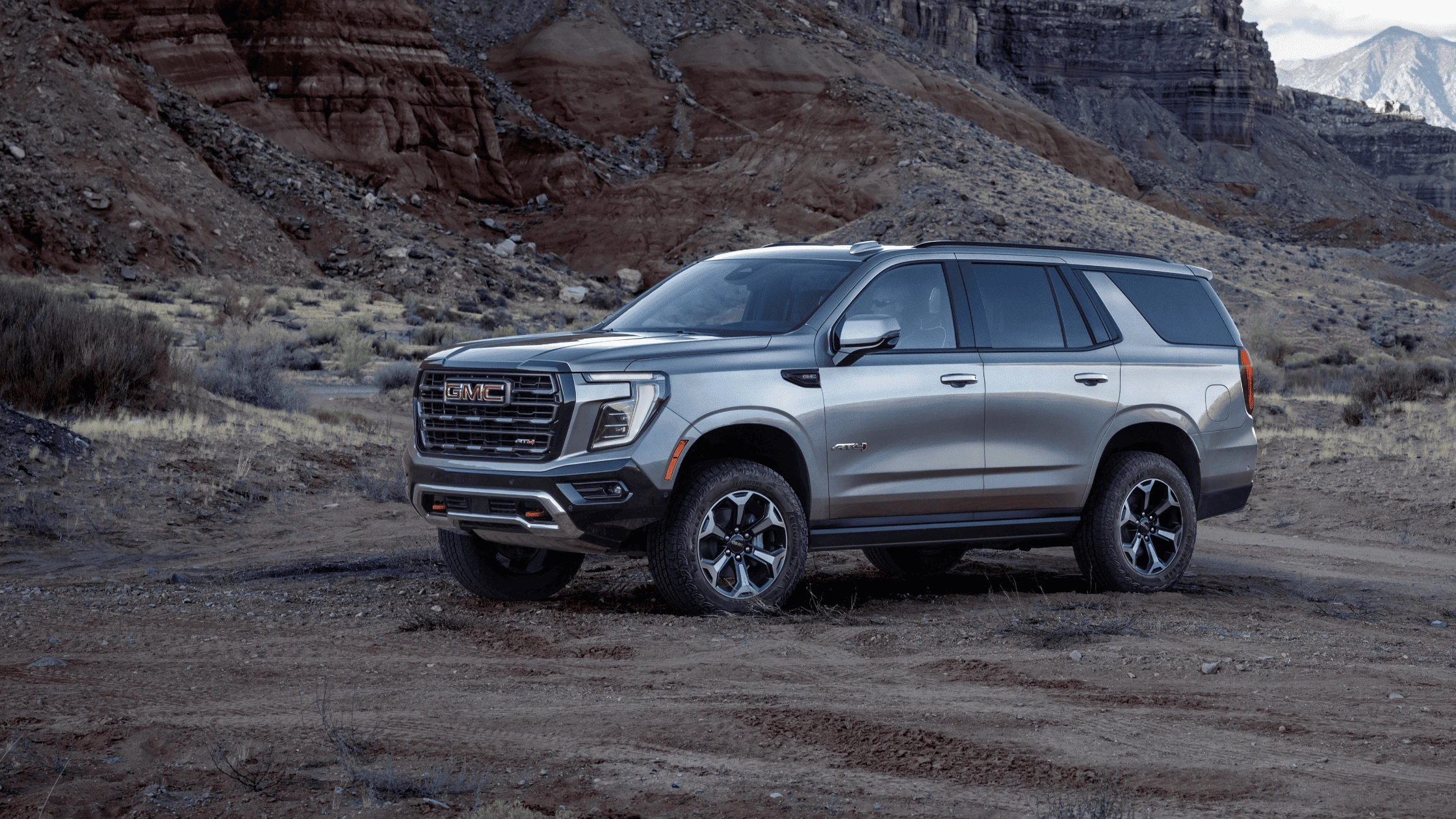 2025 GMC Yukon parked in a rugged desert canyon area outside Morganton, NC.