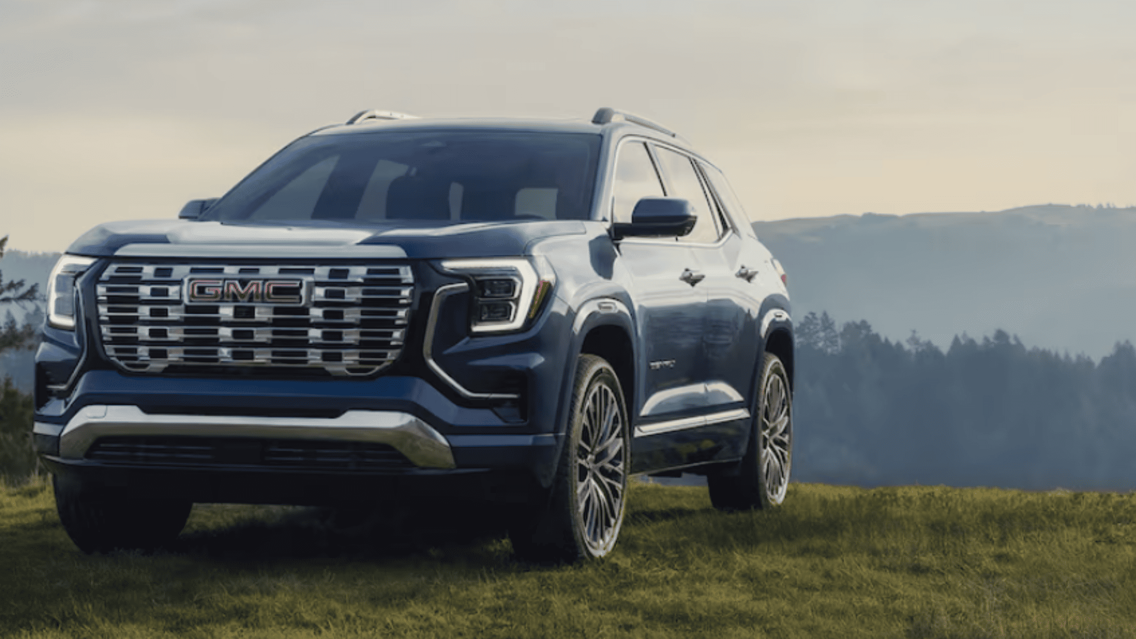 2026 GMC Terrain SUV parked in scenic countryside near Morganton NC offering family comfort