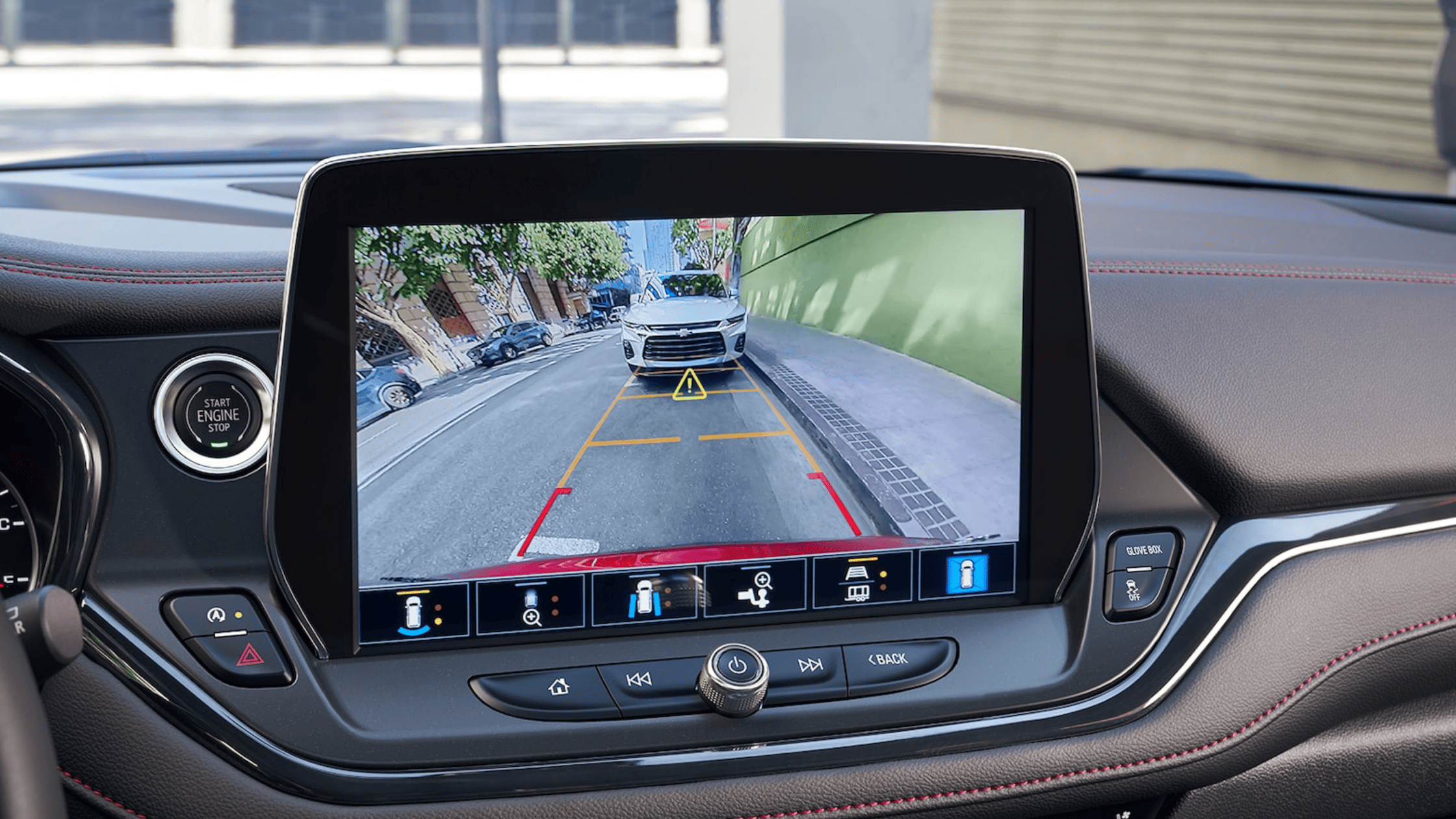 Rearview camera display in Chevrolet Blazer showing parking assist guidelines.