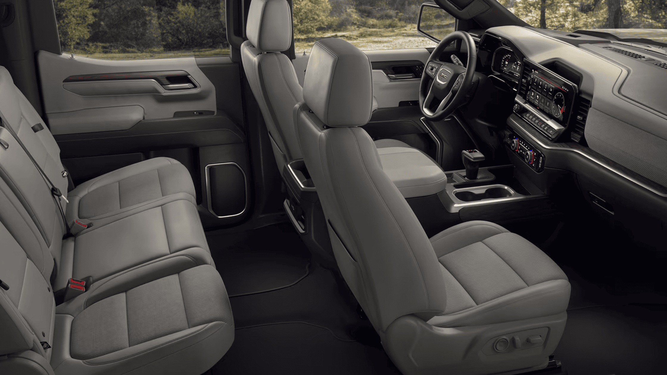 Interior cabin of the 2025 GMC Sierra 1500 with spacious front and rear seating.