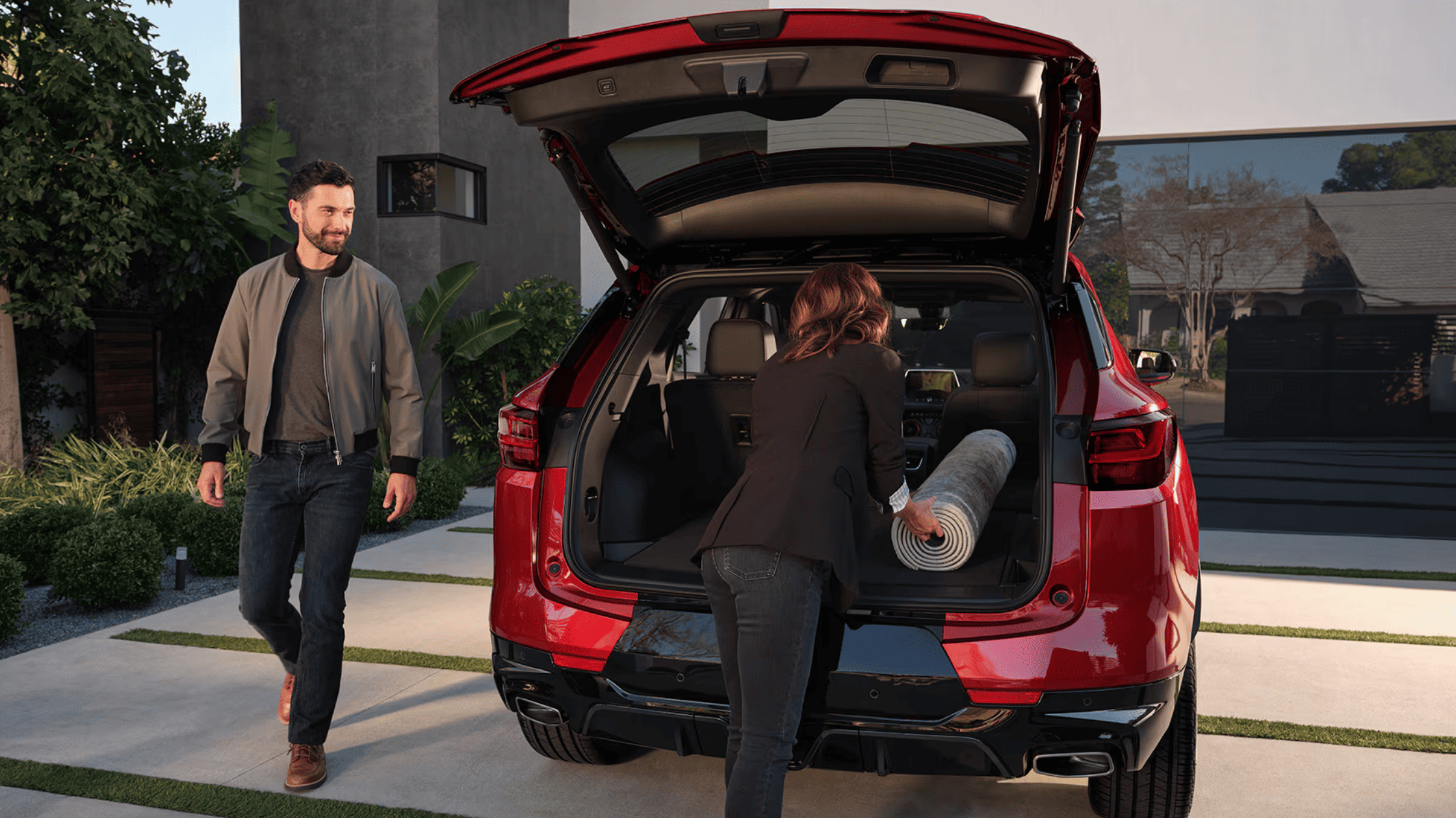 Rear cargo space of the 2025 Chevrolet Blazer with open hatch, emphasizing flexible loading options and curb-friendly design.