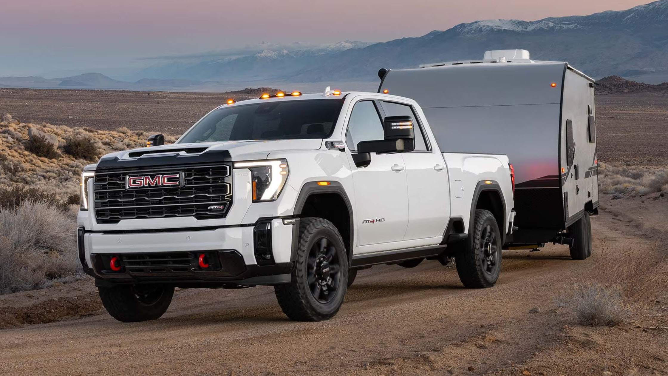 Front view of the 2025 GMC Sierra 3500 parked in West Jefferson, NC, showcasing its rugged design and heavy-duty stance.