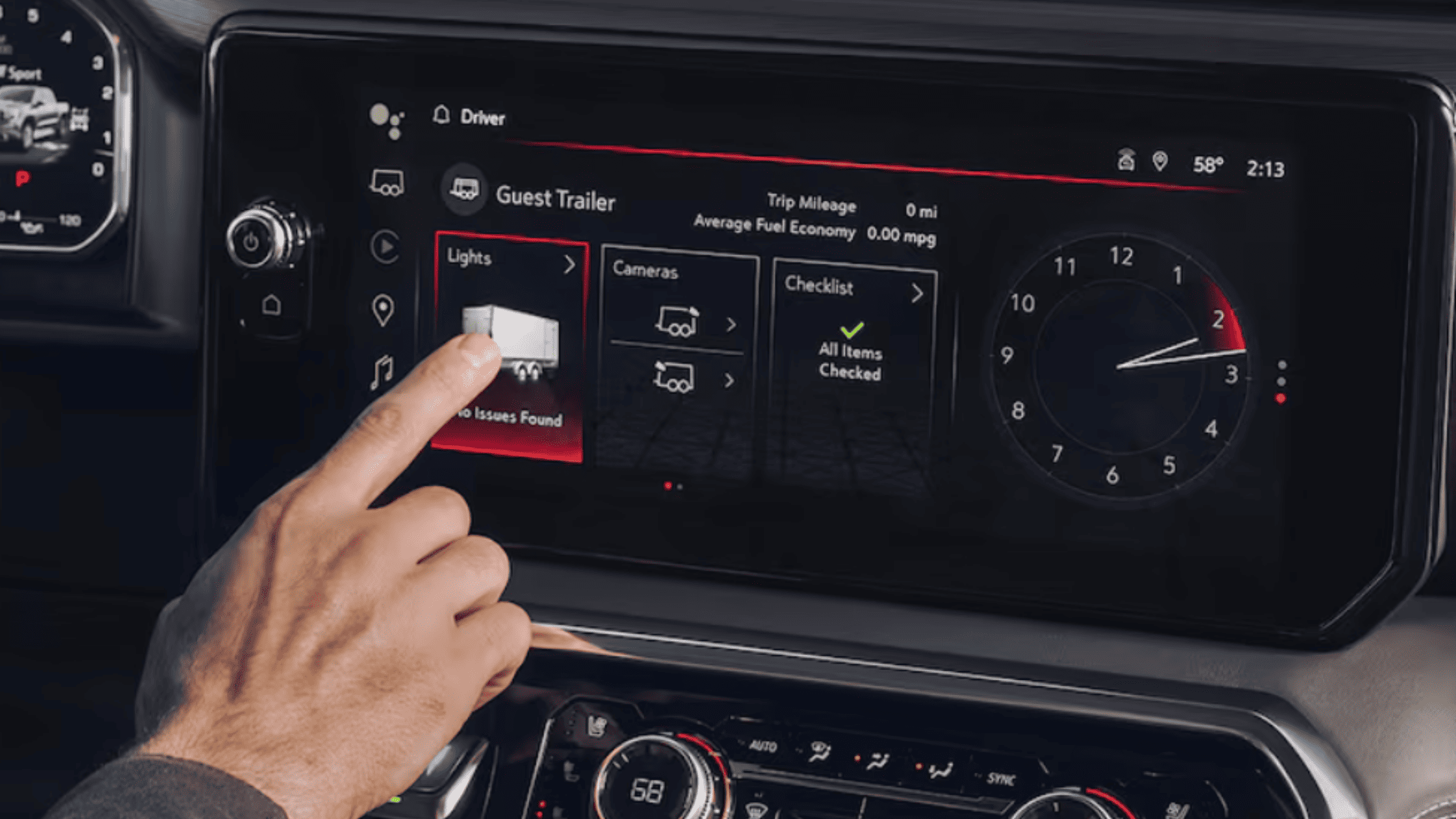 Interior infotainment screen of the 2026 GMC Sierra 1500 showing modern connectivity options like Google Assistant, Apple CarPlay, and trailer assist tools.