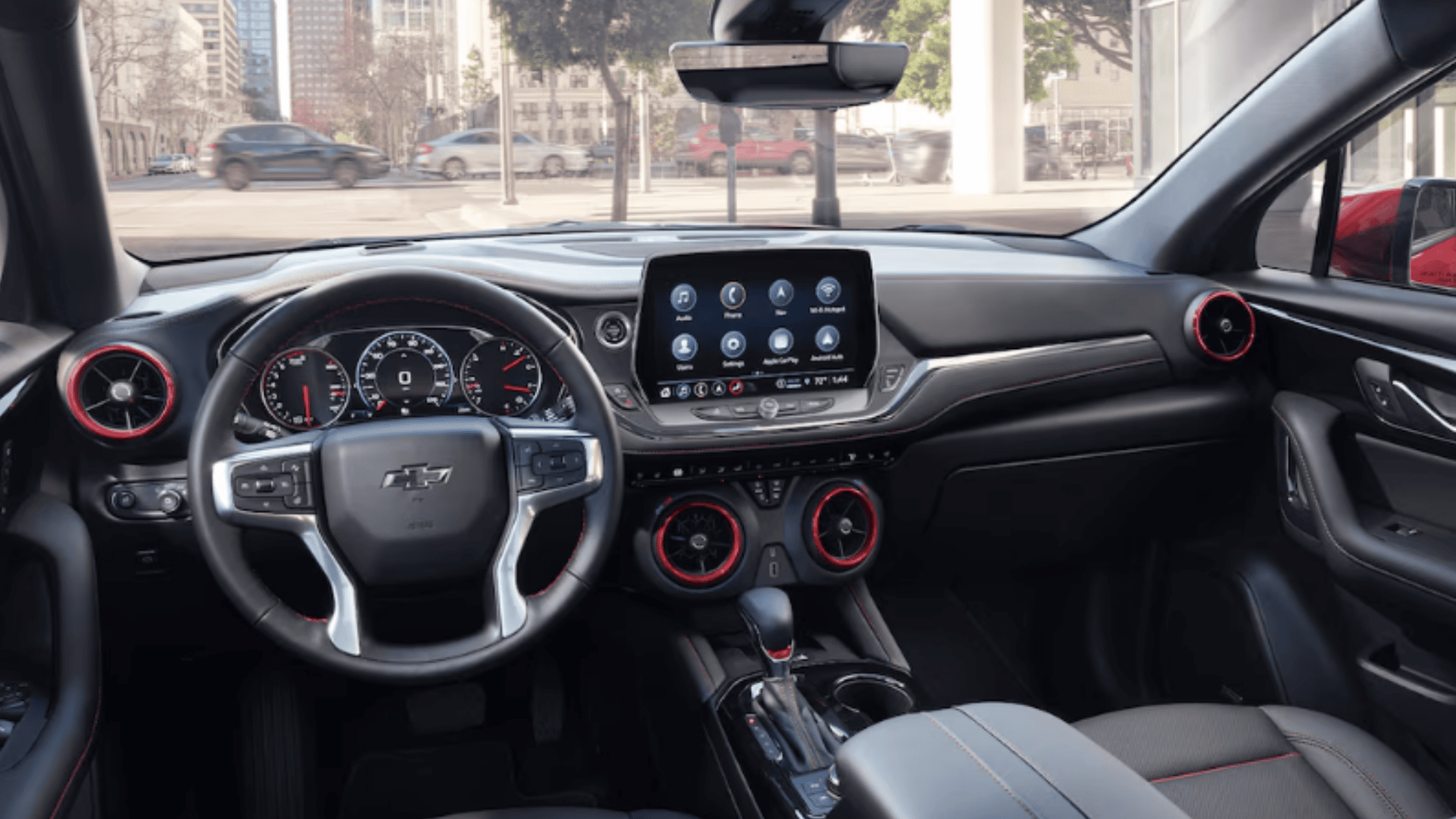 Close-up of the 2026 Chevrolet Blazer dashboard highlighting the digital driver display, touchscreen infotainment system, and advanced driver assistance features.
