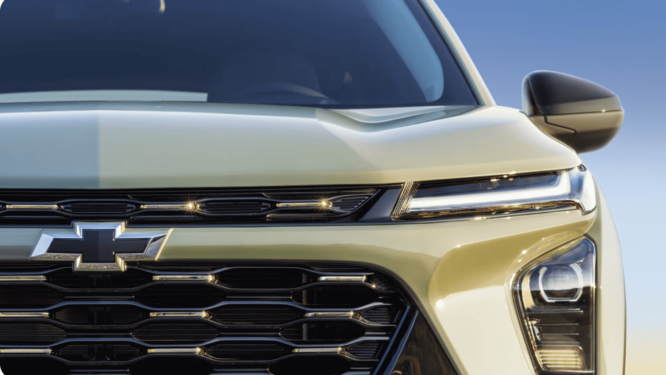 Close-up front view of a 2026 Chevrolet Trax showing grille design, LED headlights, and modern exterior styling.