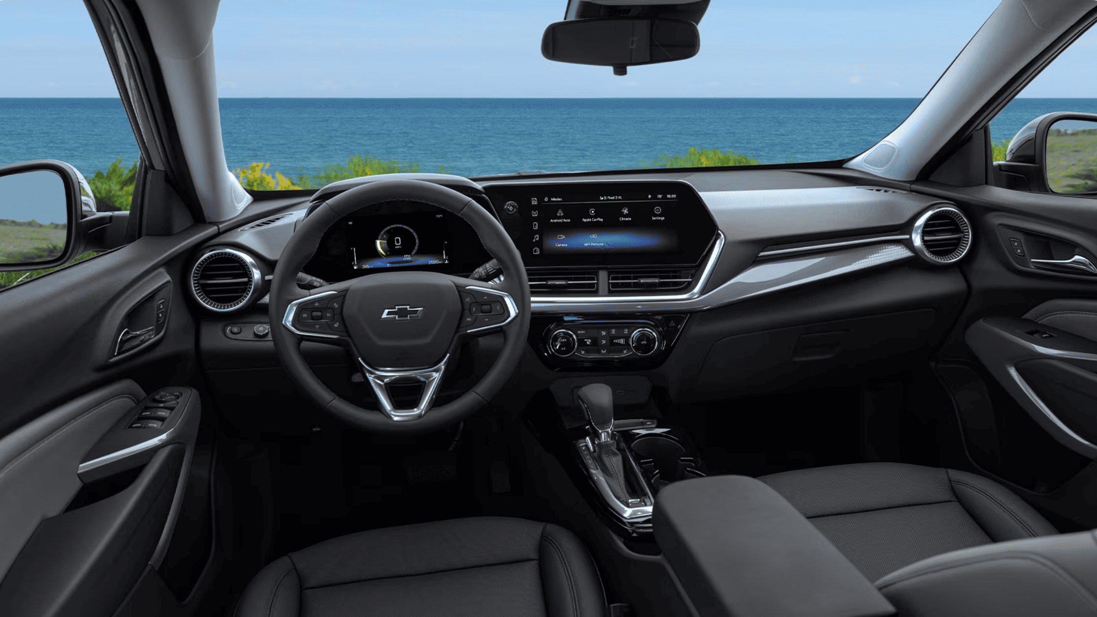 Interior view of the 2026 Chevrolet Trax showing front seats, center console, and spacious passenger cabin with modern design.