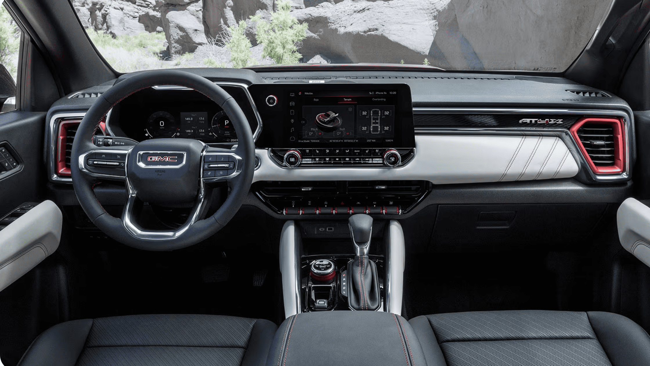 Interior of the 2026 GMC Canyon featuring digital display, touchscreen infotainment system, and advanced connectivity controls.