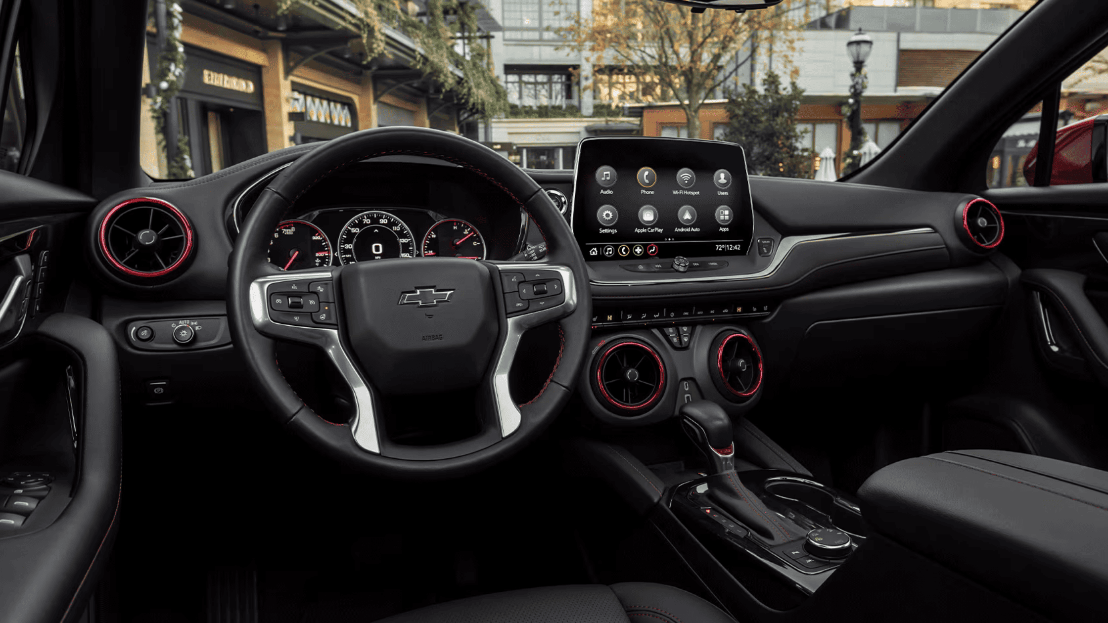 2026 Chevrolet Blazer dashboard with touchscreen infotainment and red accent interior in Boone, NC.